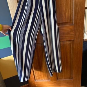 Navy blue and white jumpsuit with side slit